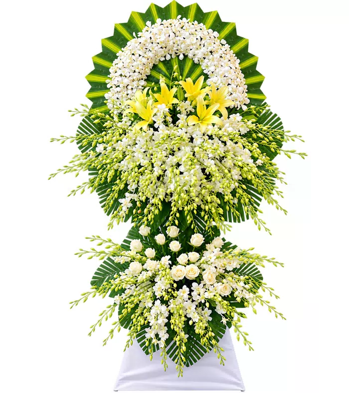 Kệ hoa viếng vàng trắng, cụm hoa dưới và vải trắng