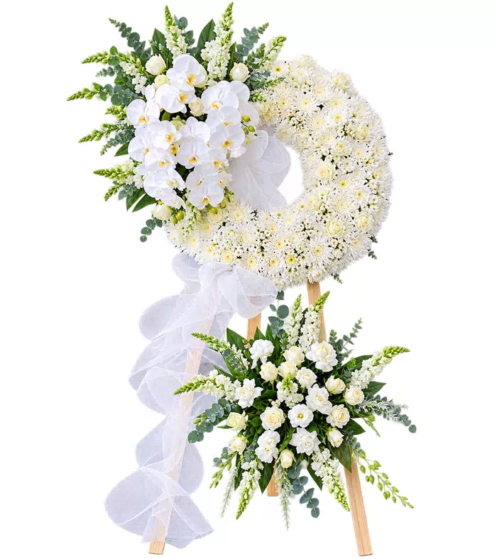 Kệ hoa viếng lan trắng, cụm hoa dưới và vải trắng