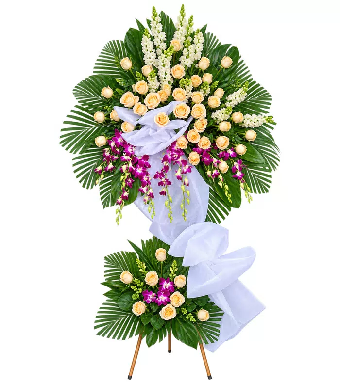 Kệ hoa viếng hồng phấn tím, cụm hoa dưới và nơ trắng