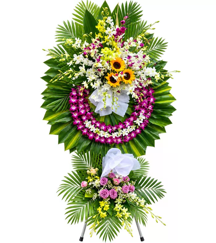 Kệ hoa viếng trắng tím, hướng dương và nơ trắng