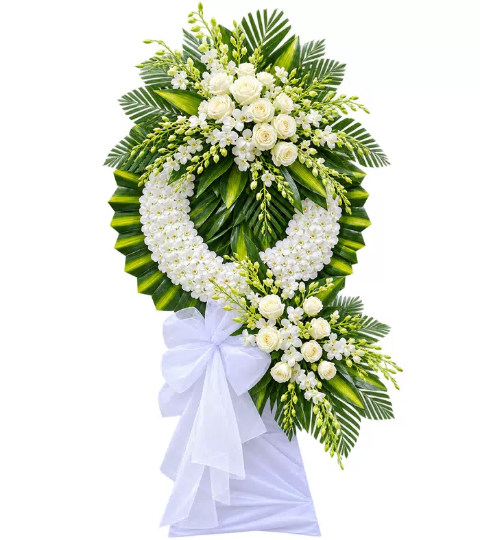 Kệ hoa viếng trắng xanh, cụm hoa dưới và vải trắng