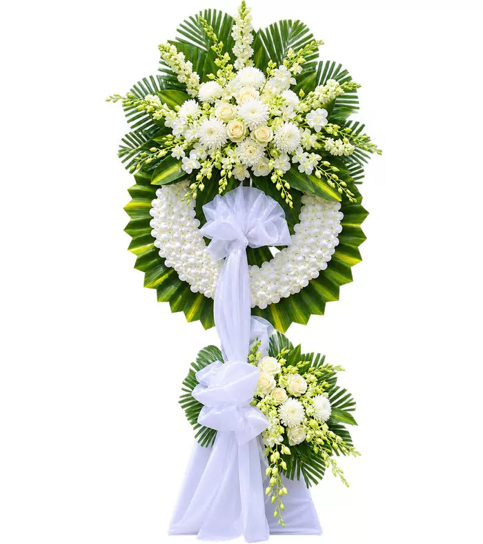 Kệ hoa viếng hồng trắng, lá xanh và vải trắng