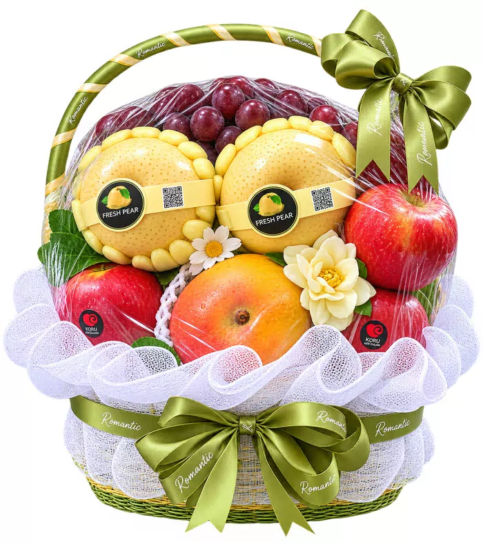 Giỏ trái cây lưới trắng, quả có múi và nơ xanh