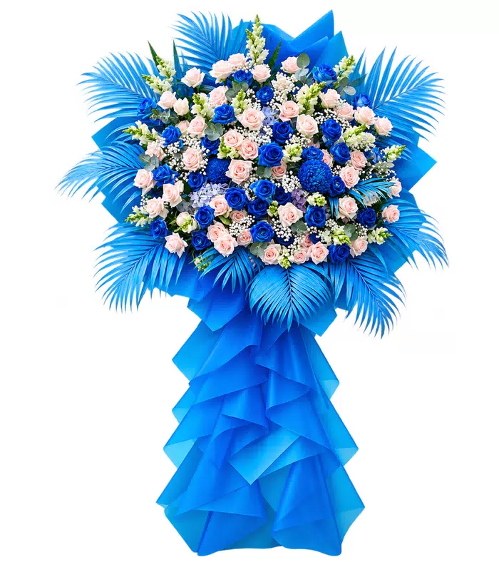 Kệ khai trương xanh hồng phấn, giấy và nơ xanh