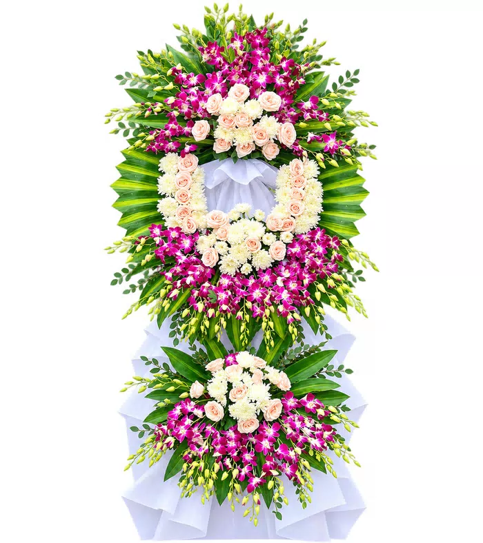 Kệ hoa viếng trắng tím, lan tím và vải trắng