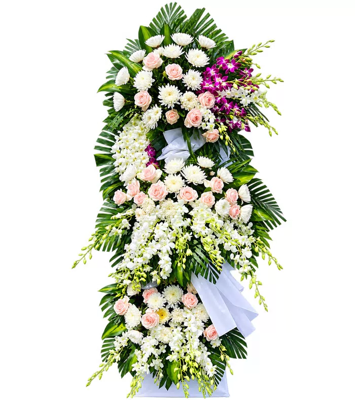 Kệ hoa viếng hồng phấn tím, hoa trắng và nơ trắng