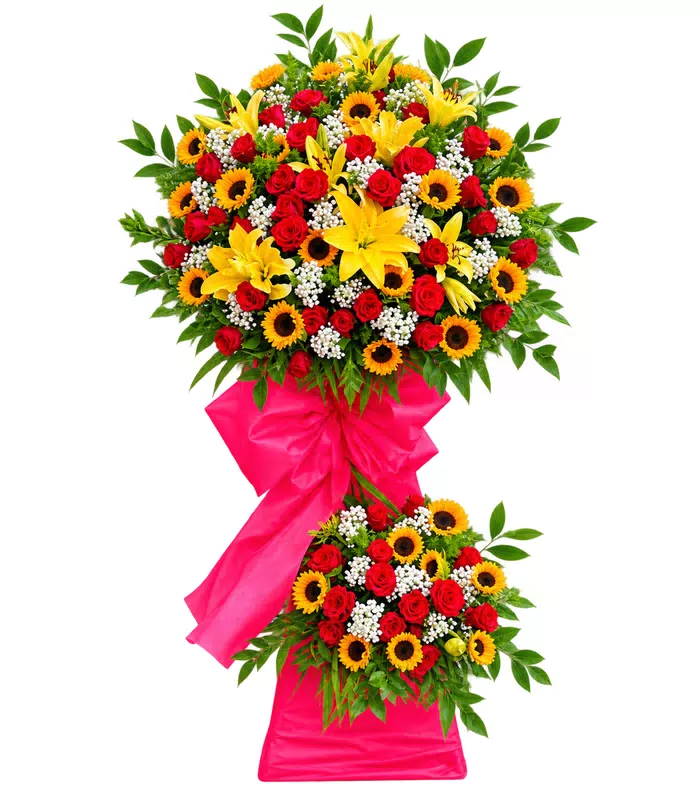Kệ khai trương đỏ vàng hai tầng, lá xanh và vải hồng